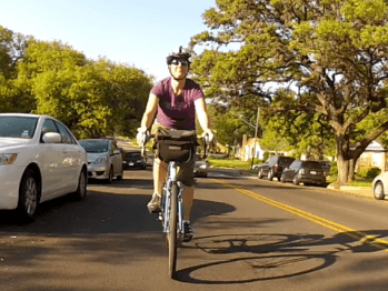 Susan passing cars on Travis heights 615w Cycling in neighborhood traffic